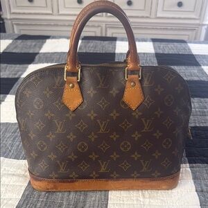 Louis Vuitton Alma Monogram Canvas Handbag